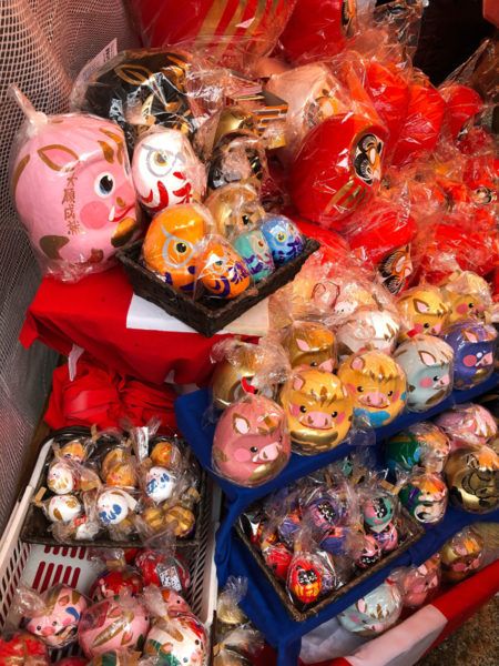 Many variations of Daruma are available for purchase at the fair.