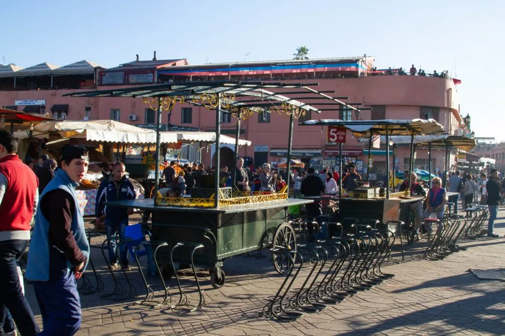 Nearly assembled food stalls, with counters, seating, and awnings, will soon be ready for customers in Jemaa el Fna.