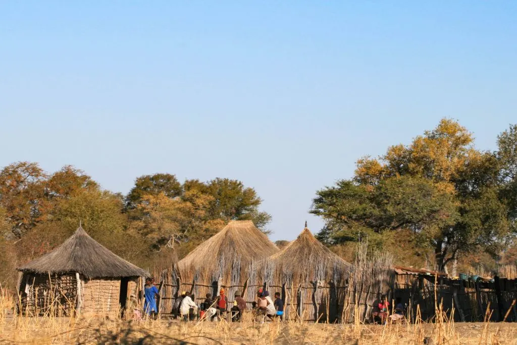 On our one day on the Caprivi Strip Namibia we found this Namibian village of thatched huts with people gathered outside.