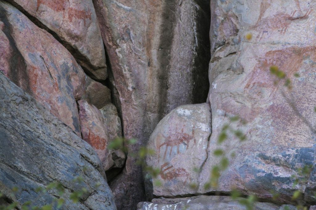 In this spiritual location for the San people, there are rock paintings of animals and symbols everywhere.