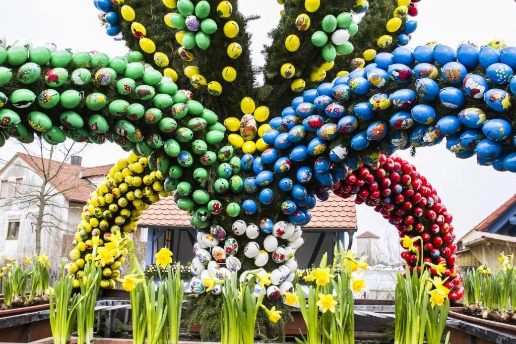 Daffodils and brightly colored Easter Eggs decorate this Franconian village Osterbrunnen.
