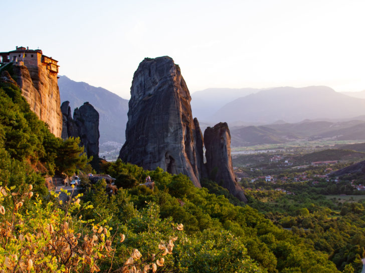 The stunning monastery of St. Nicolas as the sun sets is just one of the gorgeous views you get in Meteora.