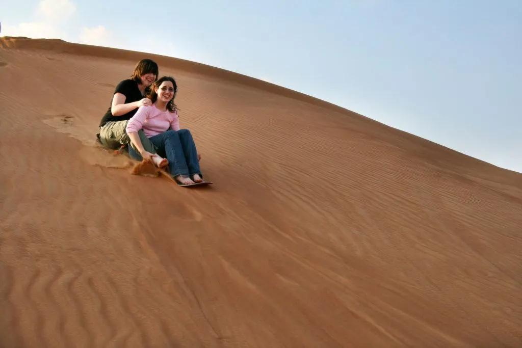 Sandboarding is one of the many adventure acitivities to try in Dubai.