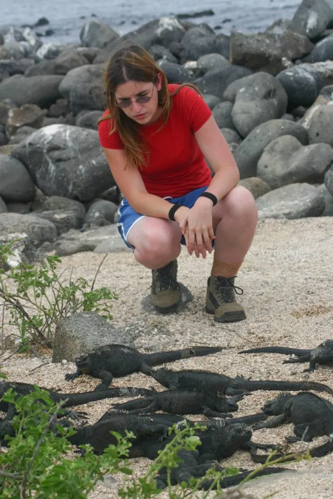 Devon admiring the many marine iguanas.