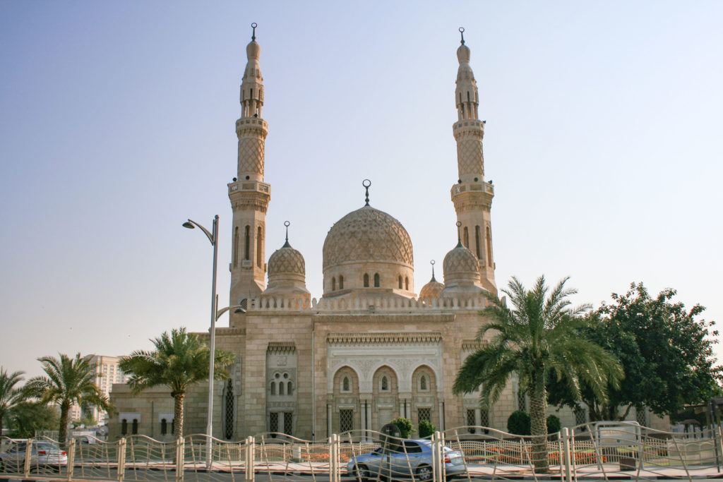 The exterior of the Jumeirah Mosque with its two minarets and Fatimad Dome.