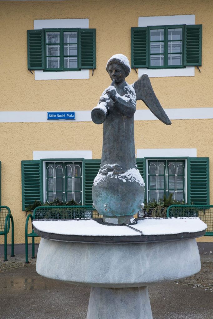 An angel statue in the Stille Nacht Platz in Arndorf.