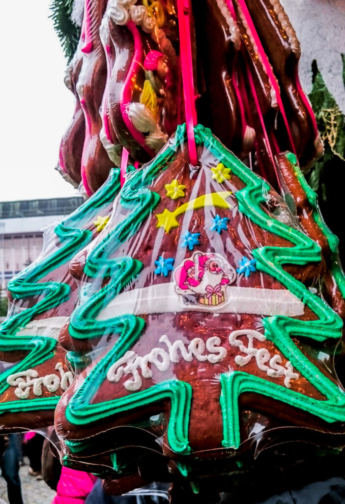 Gingerbread shapes with messages are a sign of being at a festival. In winter those festivals are Christmas Markets.
