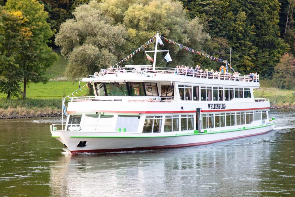 Locals and Tourists alike take the Danube boat cruise through a gorge on their way to the oldest monastic brewery in the world, Weltenburg.