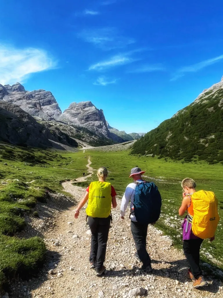 Family hikes the amazing trails of the Dolomites in Italy.