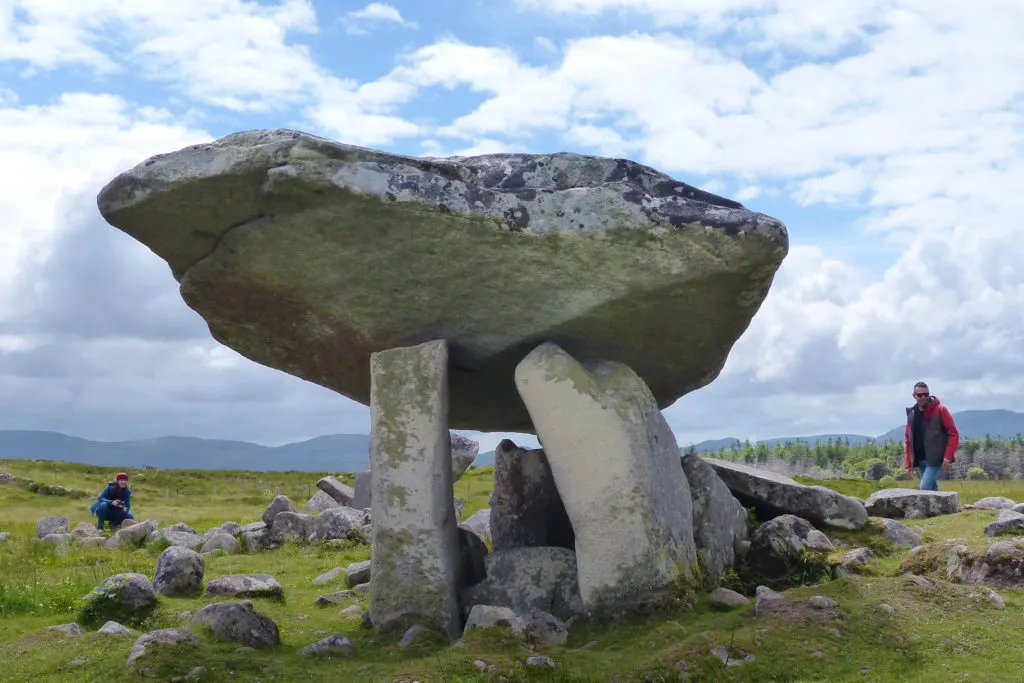 A striking dolmen with a huge cap stone located in a pasture behind St. Conal’s Church in Kilclooney More in County Donegal.