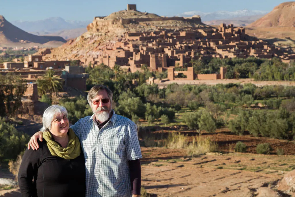 Corinne and Jim with the view of Ksar Ait Benhaddou in the background.