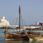 Traditional dhows wait for passengers at Doha Bay. Taking a dhow is a must-do in Qatar.