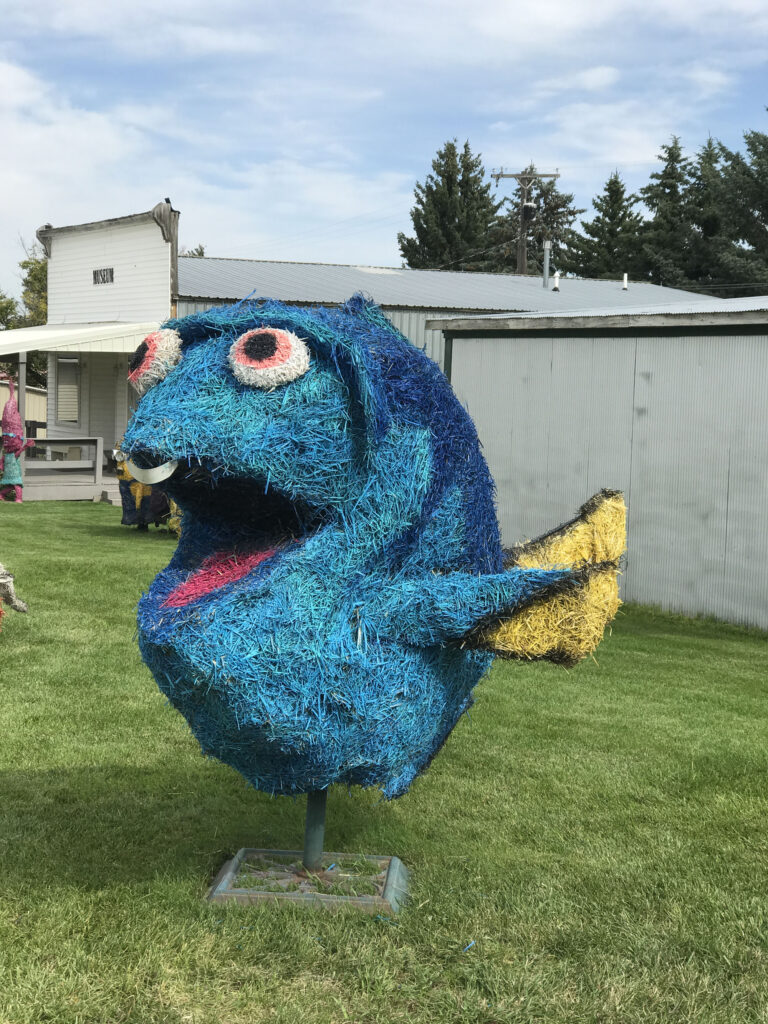 While planning your kid trip, look for unique and cute things to do, like this hay sculpture town in Montana.