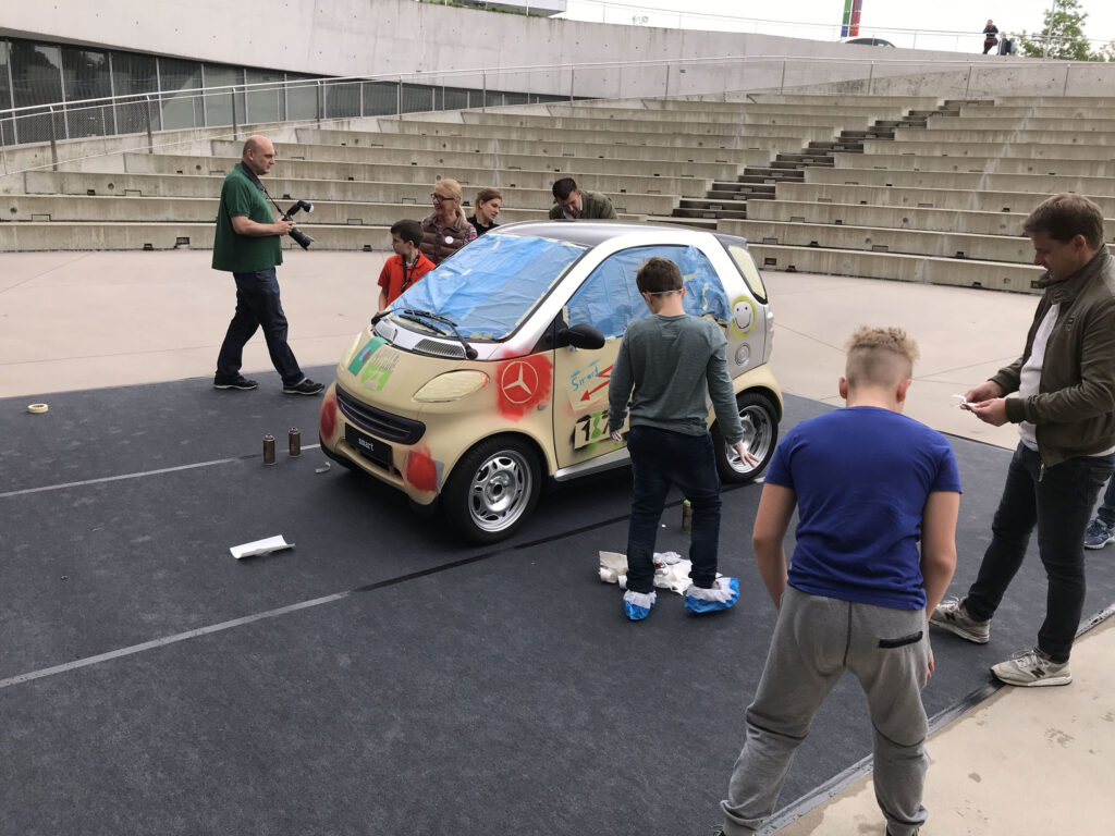 At the Mercedes-Benz museum, kids get to paint a car. Find out what extra activities are offered for kids when you are visiting a museum or sight.