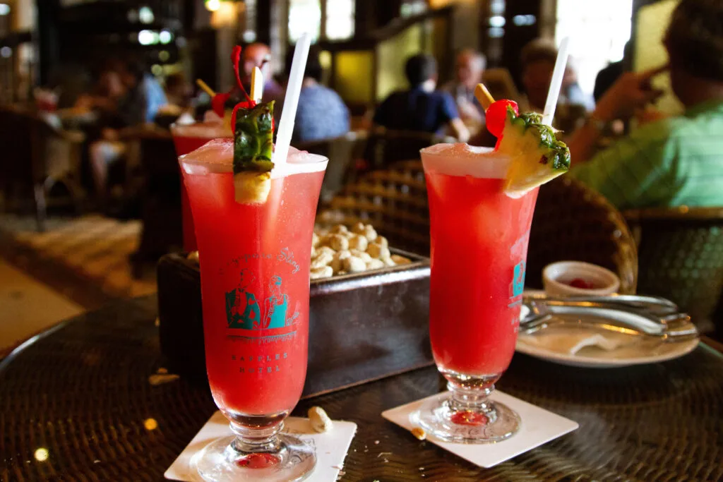 Drinking a famous Singapore Sling at the iconic Raffles Hotel is an unmissable attraction.