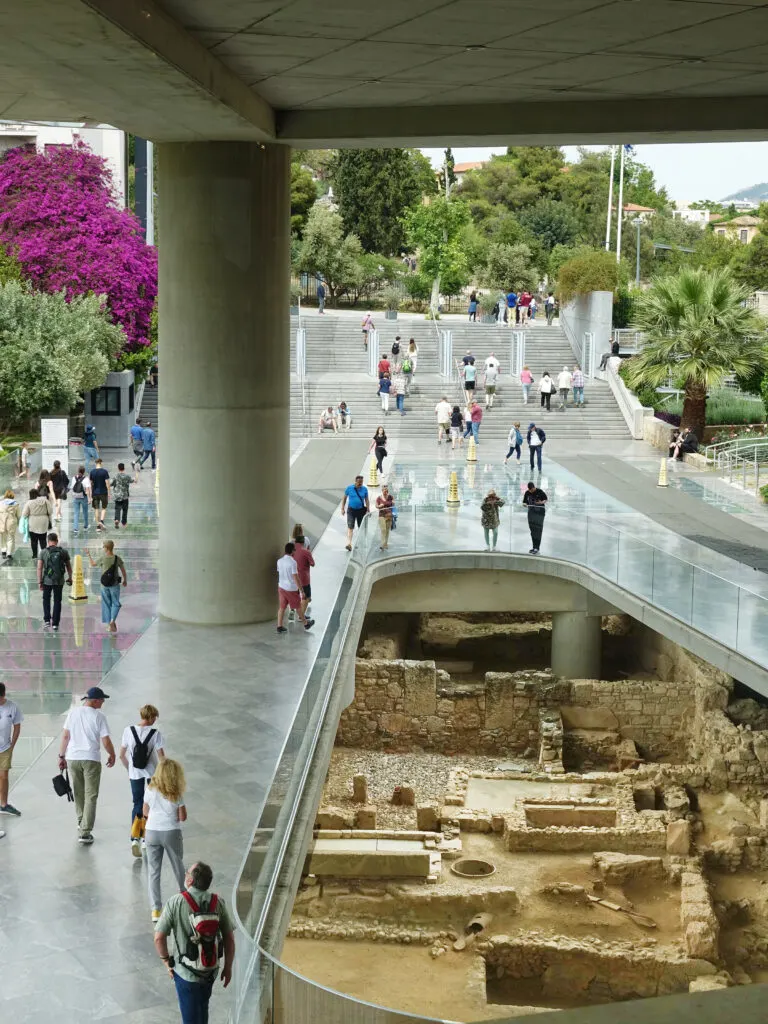 The dramatic entrance to the Acropolis Museum in Athens overlooking the remnants of an ancient Athenian neighborhood.