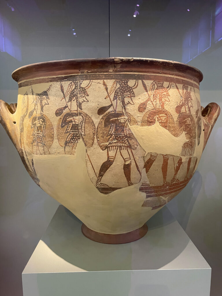 A 12th century BC mixing bowl featuring warriors in full armor at the Athens National Archaeological Museum.