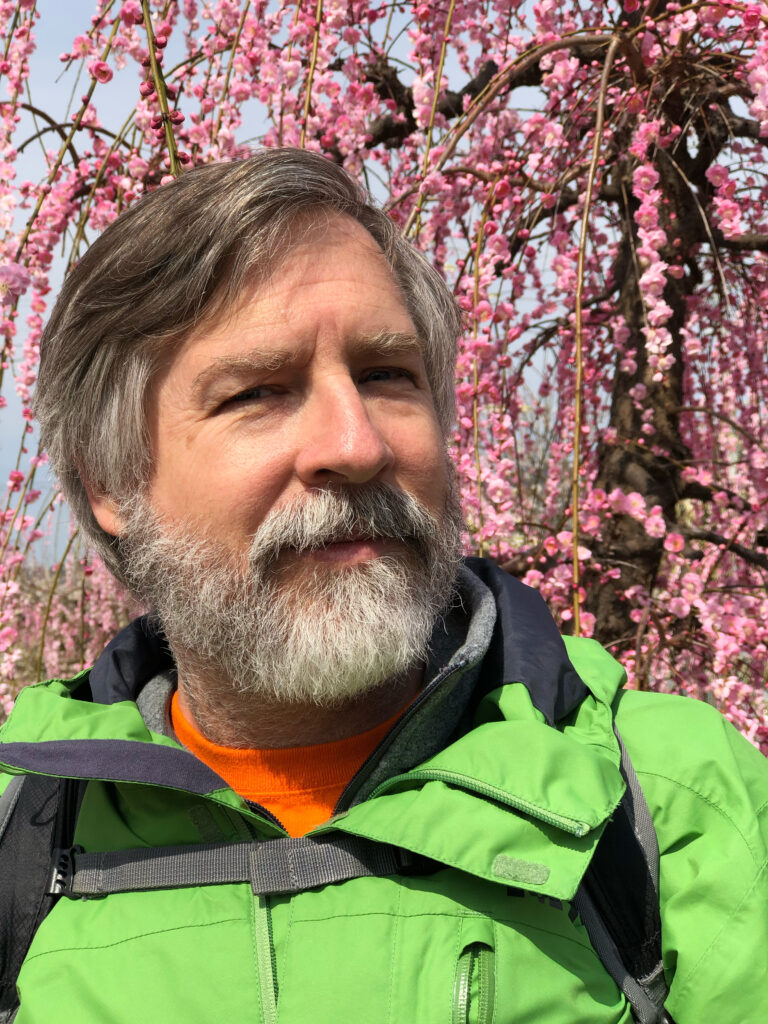 Jim enjoying the best time for cherry blossoms in Japan.