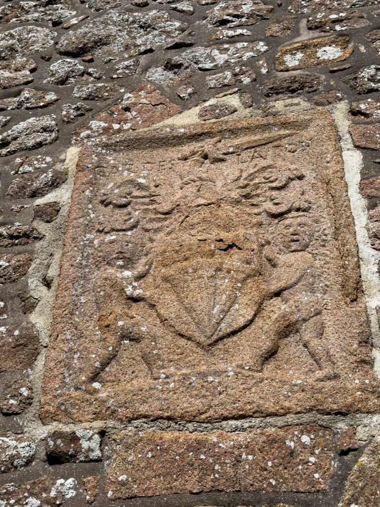 A wall stamp on Mont Orgueil Castle.
